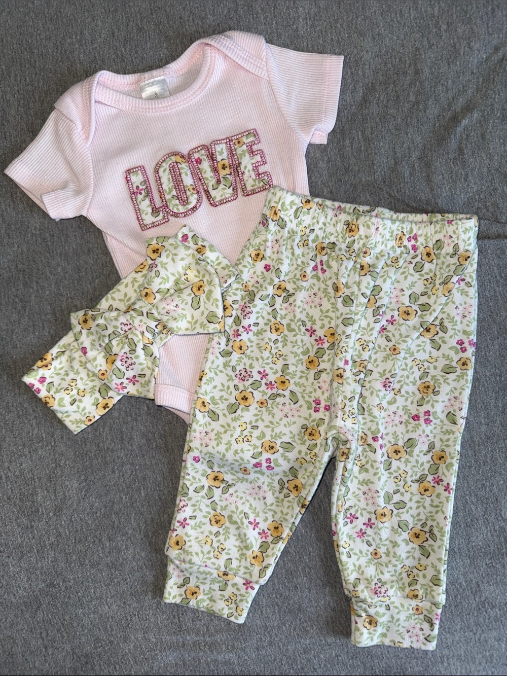 chick pea Pink Ribbed Onesie with Floral LOVE Applique